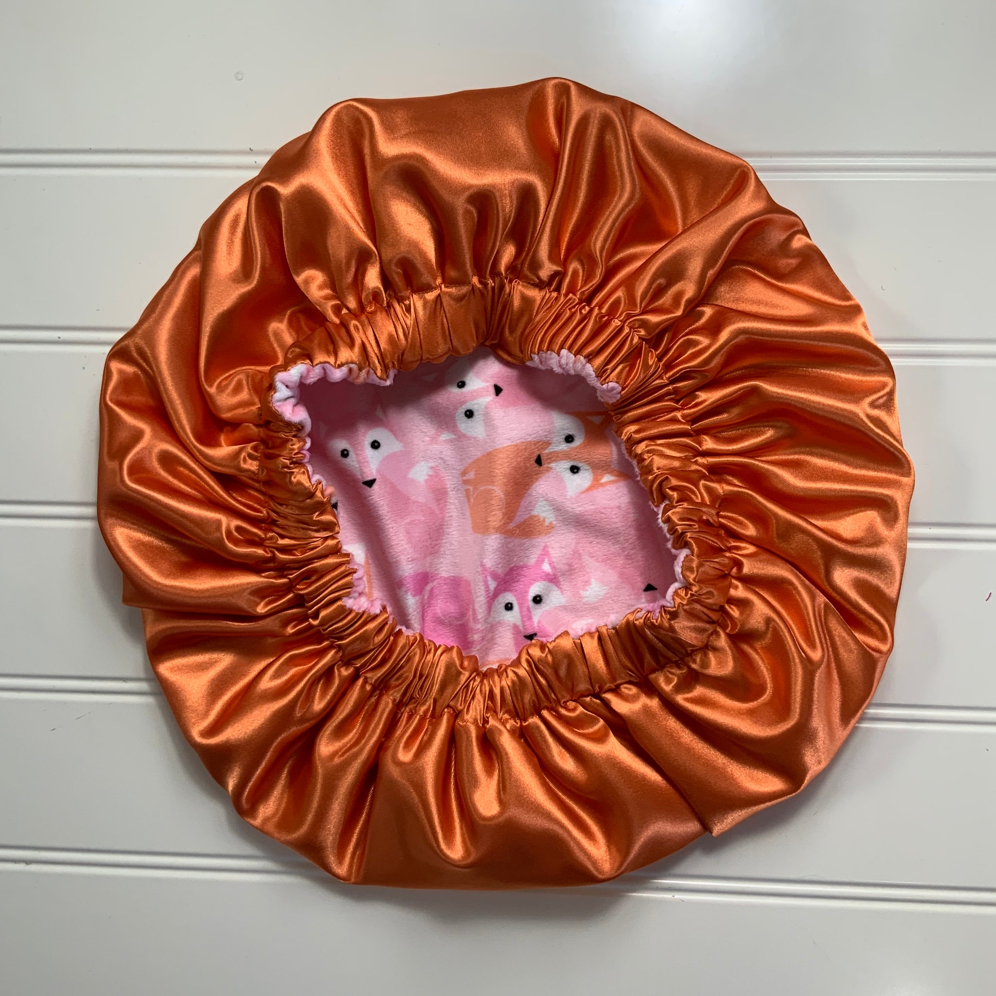 Foxes on Pink Plush Satin Lined Bonnet Orange